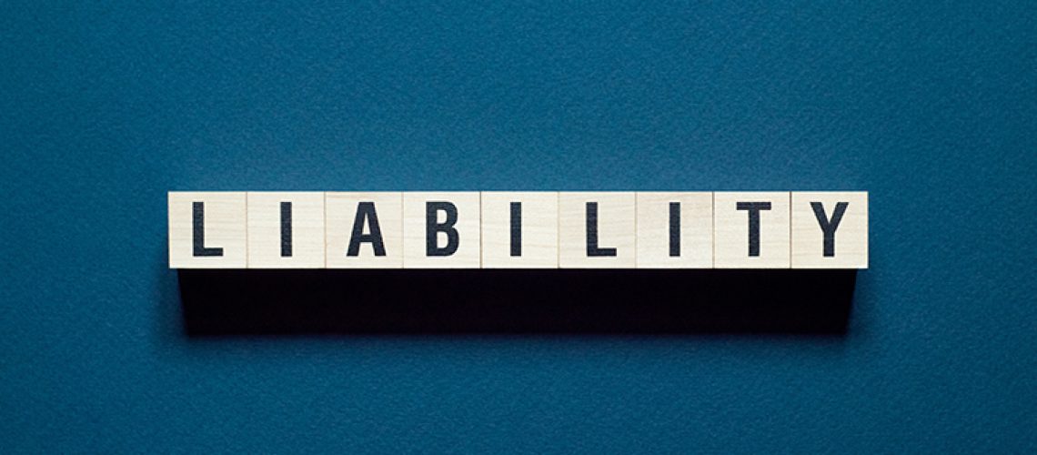 Liability word concept on cubes.